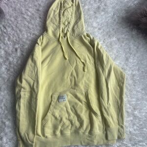 Protect the locals light yellow hoodie. Size M.